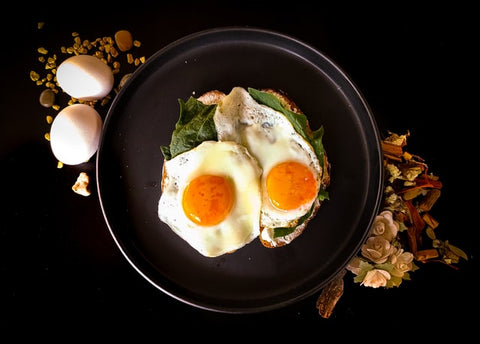 Eggs in a black plate 